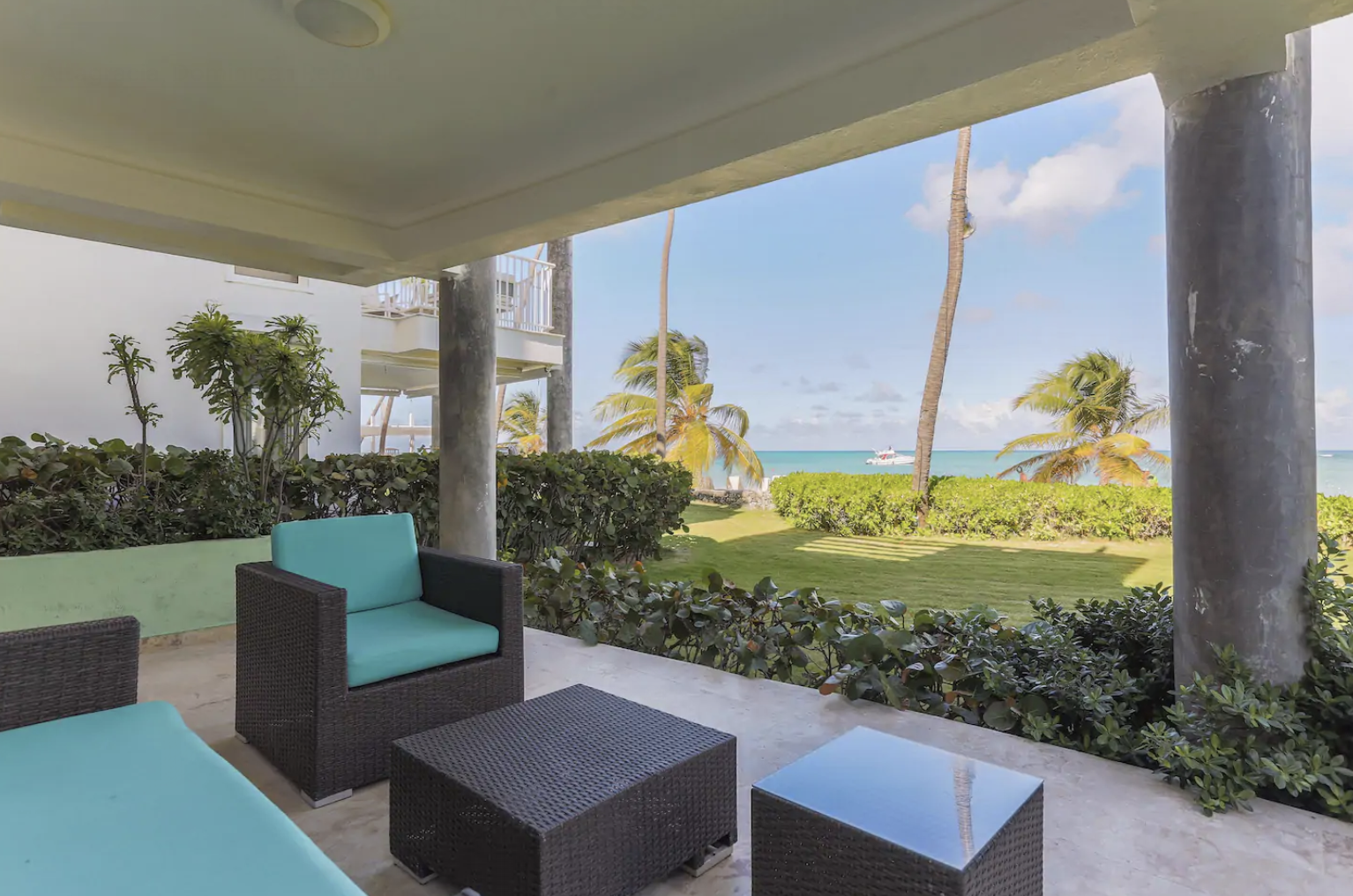 sofas with sea in the background